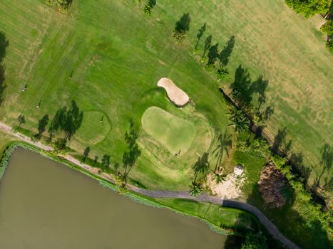 Aerial top view photo from flying drone of Golf Course, Lush green grass on golf course