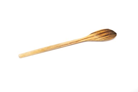 wooden kitchen spoon on white background in studio