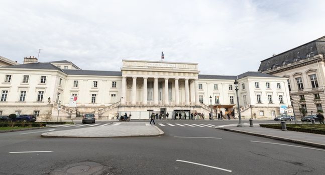 Tours, France - February 8, 2020: people walking in front of the Palais de Justice (Court of Justice) on a winter day in the city center