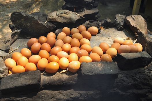 Many eggs on a hot stone platform, One way of ripening eggs, Folk wisdom of local Thai people.