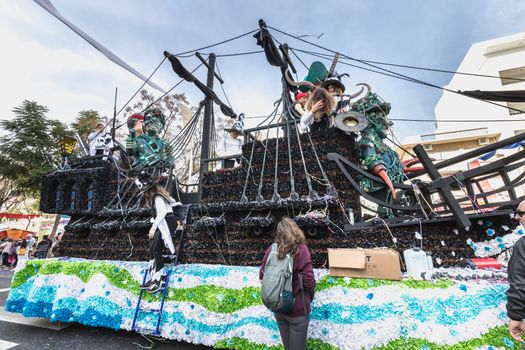 Loule, Portugal - February 25, 2020: Float parading in the street in front of the public in the parade of the traditional carnival of Loule city on a February day