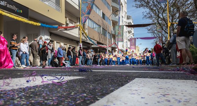 Loule, Portugal - February 25, 2020: dancers parading in the street in front of the public in the parade of the traditional carnival of Loule city on a February day