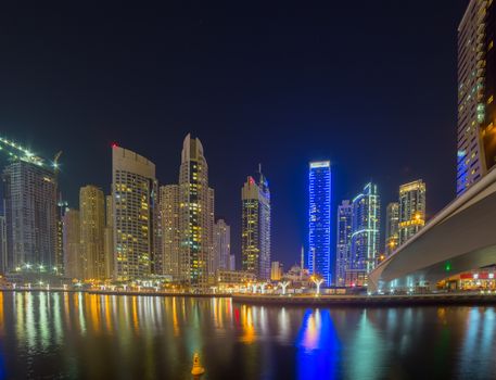 Dubai Marina night skyline Cityscape, luxury new high tech town in United Arab Emirates architecture