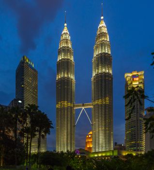 KUALA LUMPUR - FEBRUARY 19: The Petronas Twin Towers as seen from the ground on February 19, 2015, in Kuala Lumpur, Malaysia