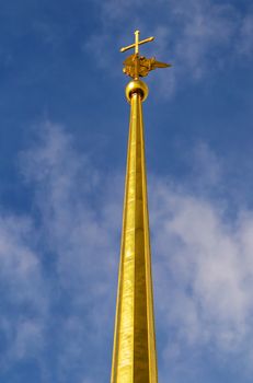 Weathercock cross Angel blue sky, Peter and Paul Fortress is the original citadel of St. Petersburg, Russia