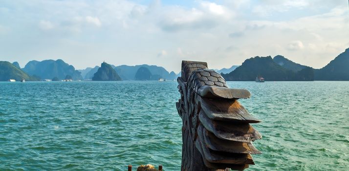 Dragon boat Ha Long bay islands Halong mountains in South China Sea, Vietnam. UNESCO World Heritage Site Asia. Indochina Discovery.