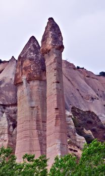 Love valley needles striped, Volcanic tuff named phallic rock pillar. Rocky landscape of Cappadocia in Turkey