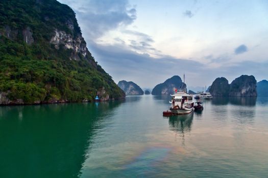 Ha Long bay islands Halong mountains in South China Sea, Vietnam. UNESCO World Heritage Site Asia. Indochina Discovery.