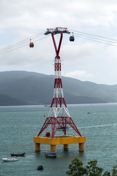 Cable car eiffel tower to Vin pearl Amusement Park Island cableway long rope road on water bay Nha Trang, Vietnam