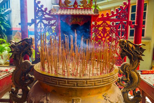 Incense Smoke Sticks Burning Out with Silky Smoke. Asian Religion Aroma Sticks Praying