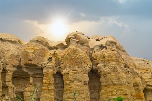 Open air museum, Goreme national park Rising Sun Volcanic rock formations in Cappadocia, Anatolia, Turkey.