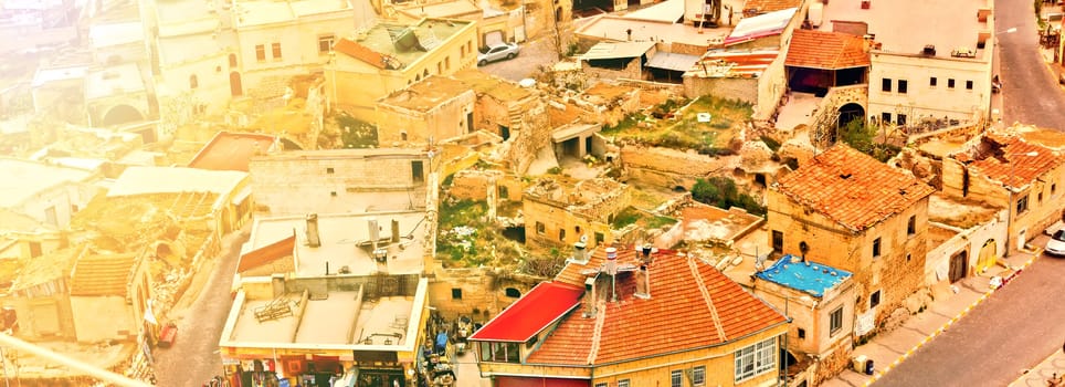Uchisar castle, Turkey. Rural Cappadocia Mountain landscape panoramic view. Stone houses