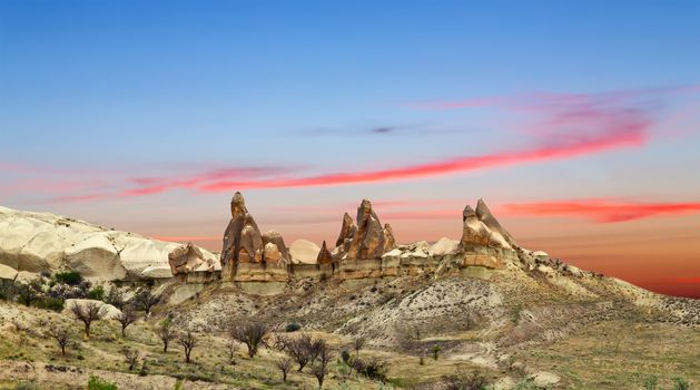 Goreme National Park panorama and the Rock Sites of Cappadocia, Anatolia, Turkey. Volcanic mountain landscape.