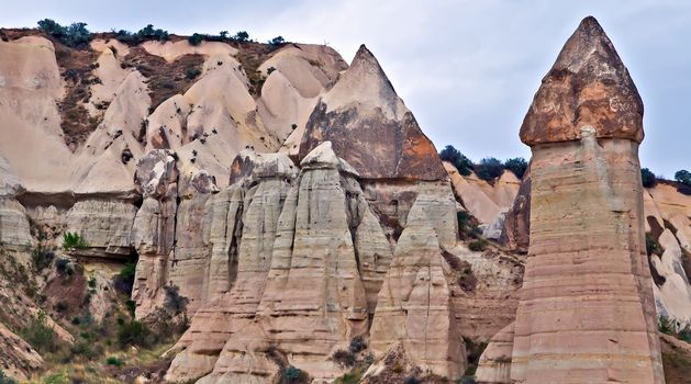 Rock volcanic formations Stone columns, mountain Love valley landscape, Turkey, Cappadocia. Goreme national park.