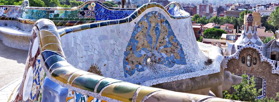 colorful ceramic bench at Parc Guell designed by Antoni Gaudi, Barcelona, Spain.