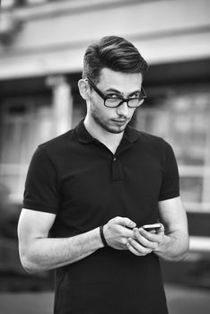 Portrait of handsome caucasian man st street