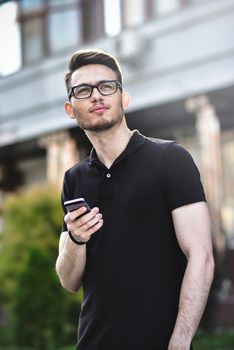 Portrait of handsome caucasian man st street