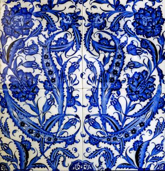 Textured ancient blue artistic mosaic tiles decor flower. Blue ceramic tile surface textures.