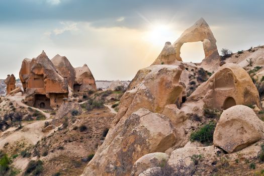 Cave towns Goreme National Park and the Rock Sites of Cappadocia, Anatolia, Turkey. Volcanic mountain landscape.