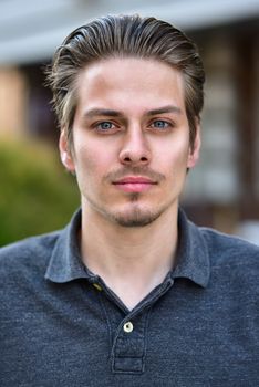 Portrait of handsome caucasian man st street