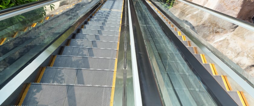 escalator is a moving staircase