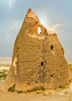 sunrise in the Volcanic rock formations in Cappadocia, Anatolia, Turkey. Travel background