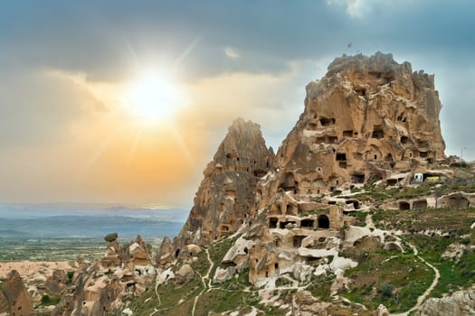 sun castle in rock formation landscapef Cappadocia. Nevsehir Province. Turkey Travel background