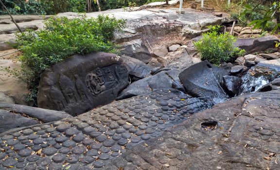 Shiva Linga carved a symbol or Icon of Hindu God Shiva used to perform puja or prayers in the Kbal Spean Sanctuary in Angkor, Cambodia