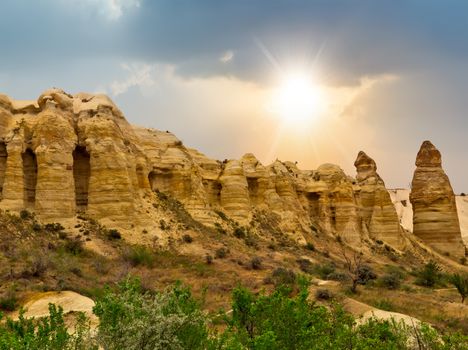 Rising Sun Love Valley because of the pillar like rock formations and walk till Uchisar Travel background