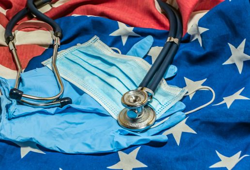 Quarantine american national flag background Stethoscope Respirator Surgical Mask health care concept COVID-19