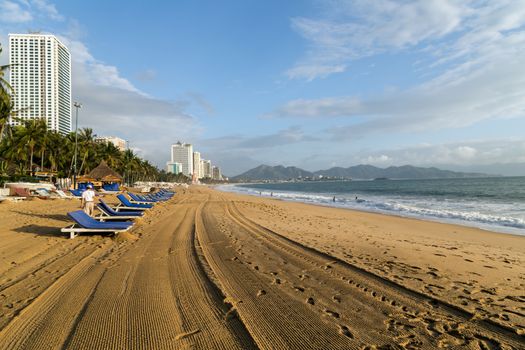 Deckchairs, umbrella and chair, parasol on the tropical sand beach