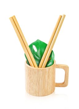 Ecological bamboo straws tube and wooden glass isolated on white background, Save clipping path.