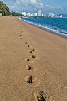 Footprints, steps in the City Sand Beach Nha Trang Bay of the South China Sea in Khanh Hoa province, Vietnam.