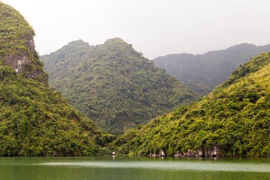 Ha Long bay islands Halong mountains in South China Sea, Vietnam. UNESCO World Heritage Site Asia. Indochina Discovery.