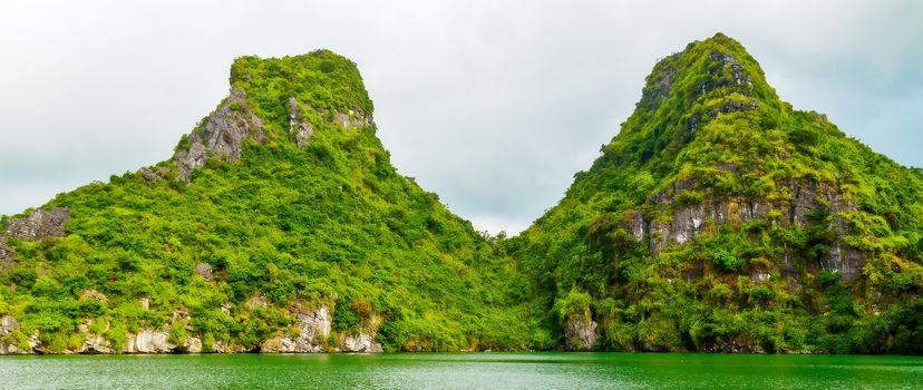 Ha Long bay islands Halong mountains in South China Sea, Vietnam. UNESCO World Heritage Site Asia. Indochina Discovery.