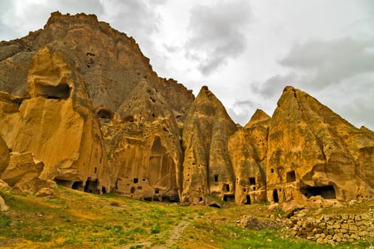 landscape cave houses of Cappadocia and Goreme National Park. Urgup, Goreme, Guzelyurt and Uchisar. Turkey.