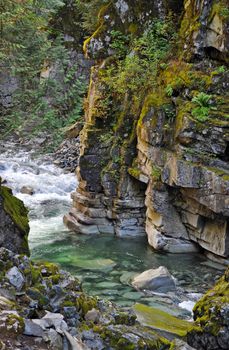 Crystal clear river flowing through Coquihalla Canyon in Canada