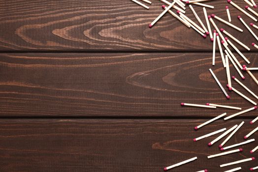 Matches on a white isolated background. Matches on a wooden background. Matches