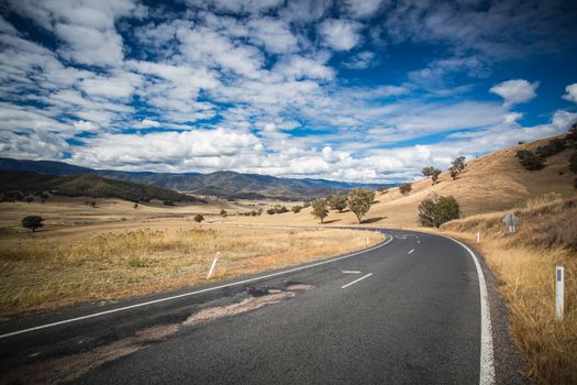 The Alpine Way road near Khancoban on a sunny autumn day in New South Wales, Australia