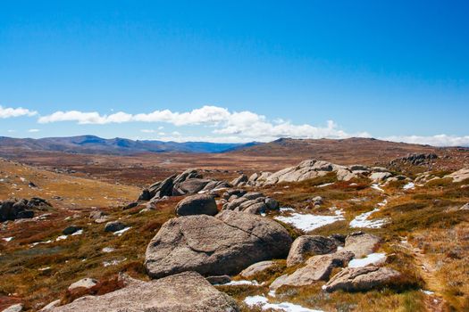 A spectacular view across the valley on the Kosciuszko walk near the summit of Thredo in Snowy Mountains, New South Wales, Australia