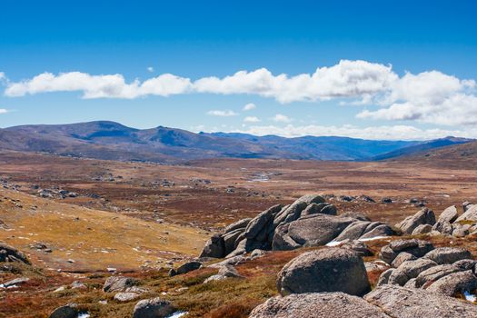 A spectacular view across the valley on the Kosciuszko walk near the summit of Thredo in Snowy Mountains, New South Wales, Australia