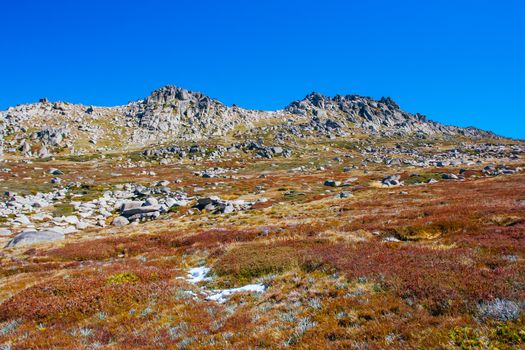 A spectacular view across the valley on the Kosciuszko walk near the summit of Thredo in Snowy Mountains, New South Wales, Australia