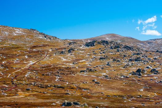 A spectacular view across the valley on the Kosciuszko walk near the summit of Thredo in Snowy Mountains, New South Wales, Australia