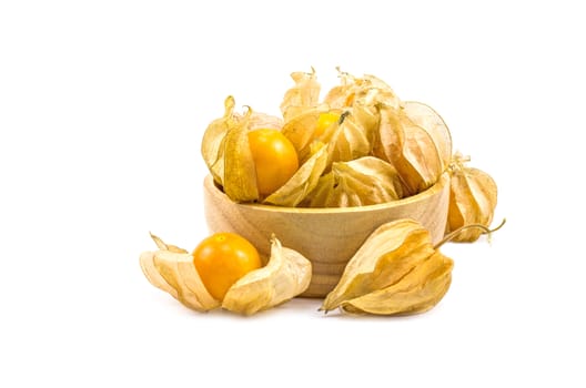 Cape gooseberry put in wood bowl physalis isolated on white background.