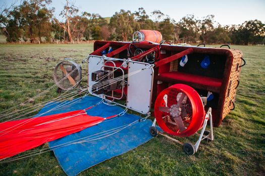 A hot air balloon being setup on a cold winter's morning in Yarra Valley, Victoria, Australia