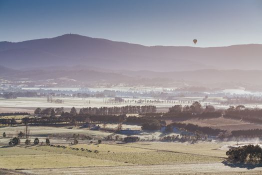 A sunrise hot air balloon flight over the Yarra Valley in Victoria, Australia