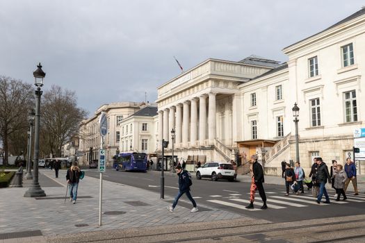 Tours, France - February 8, 2020: people walking in front of the Palais de Justice (Court of Justice) on a winter day in the city center