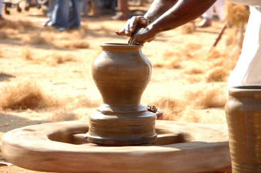 Potter Making Pot