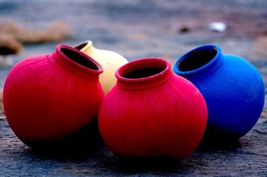 Three colorful pots