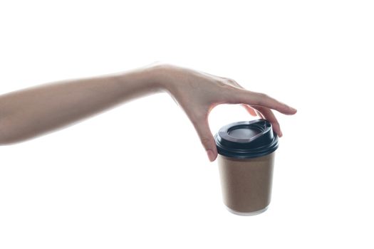 Woman hand holding a brown coffee paper cup isolated on white background.